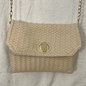 Deux lux woven faux leather fancy bag. Has a small stain see pictures